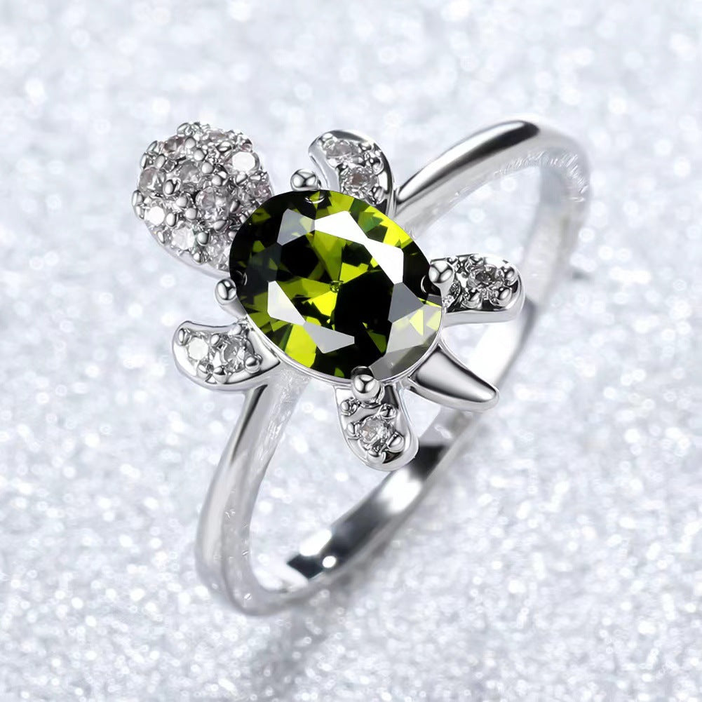 Platinum Ring With A Colored Tortoise Design Featuring Blue Diamondsunisex